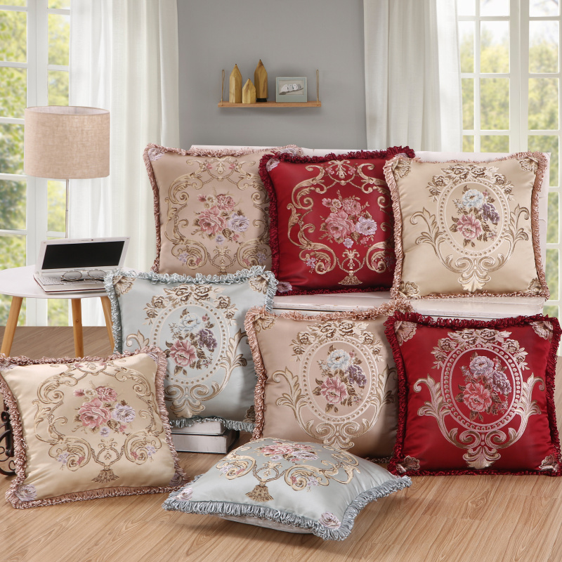 Ornate floral jacquard cushion covers in cream, red and duck egg